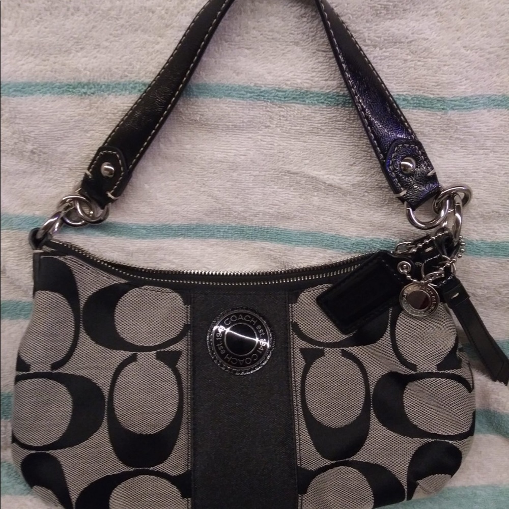 Gray and black COACH purse